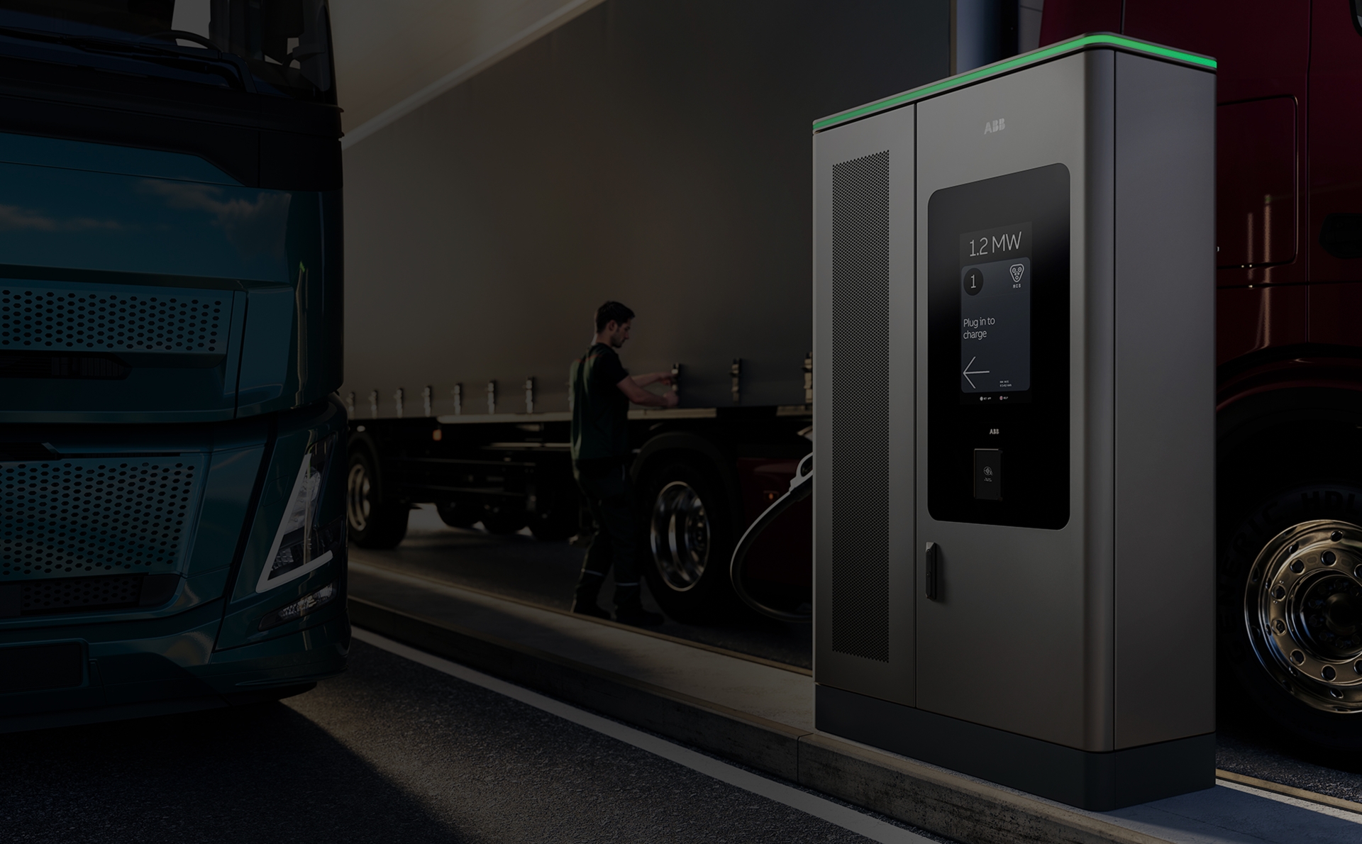 MCS1200 charger ready for use at a truck-charging bay where a driver checks his truck