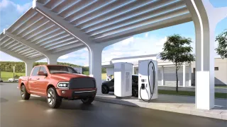 Two electric vehicles in a charging station