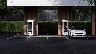 Two A400 installed in a parking lot,  connected to an electric vehicle