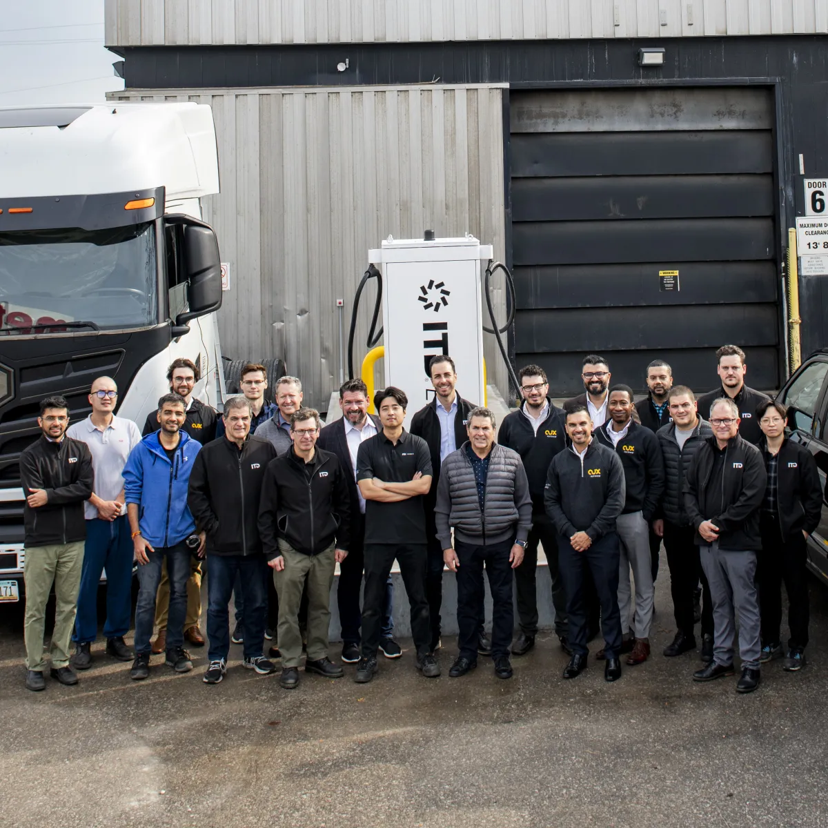 •	Officials from ABB E-mobility and ITD Industries with the first A400 All-In-One fast charger energized in North America.