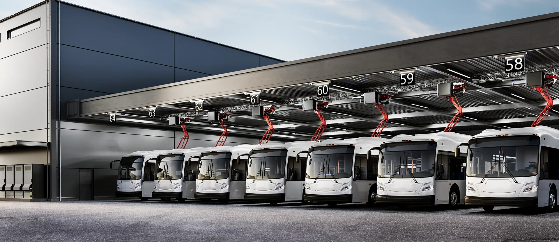 Electric buses charging in a row at a bus depot