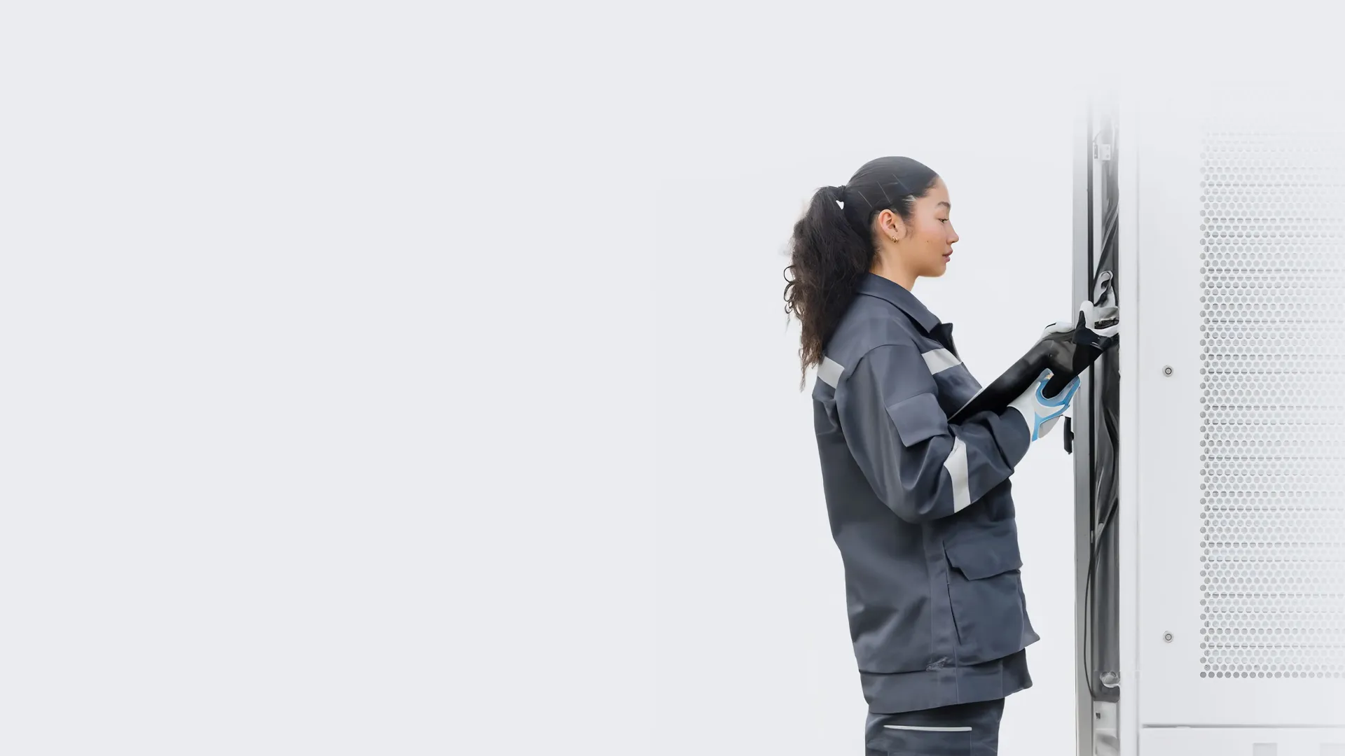 ABB E-mobility engineer servicing an EV charger 